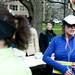 Susan Collins, the Joan and Sanford Weill Dean of Public Policy, volunteers and assists at the run in honor of the Boston Marathon on U-M's campus on Saturday, April 20. AnnArbor.com I Daniel Brenner